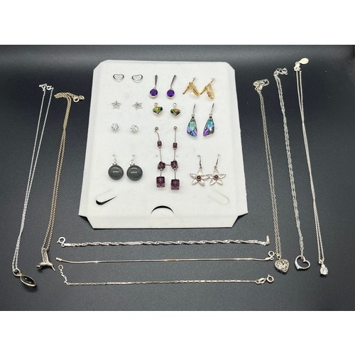 44 - selection of silver jewellery to include earings , silver bracelets & chain & pendants etc