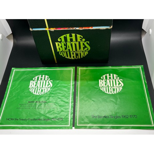 51 - box set of beatles singles complete