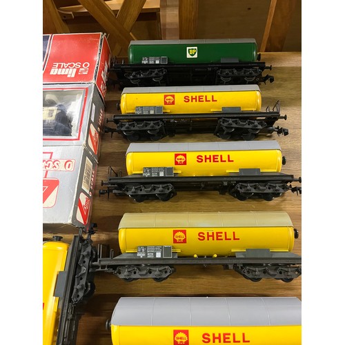 52 - collection of lima o gauge  railwayana to include 1 x engine d6524,  8 x carriages 3 boxed, 10 petro... 