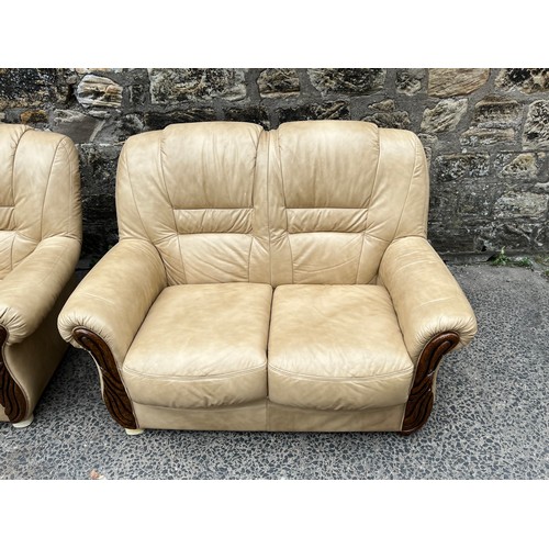 65 - italian leather 3 x 2 sofas with wood trim