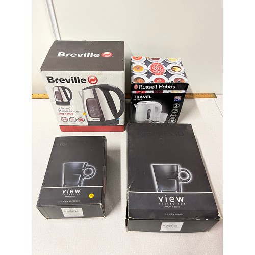 507 - Breville kettle & Russell Hobbs travel kettle with boxed Nespresso cups & saucers.