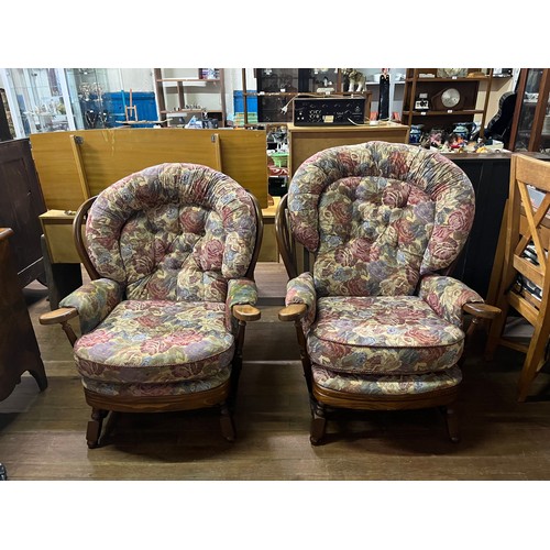 22 - a pair of his & hers Joynson and Holland lounge chairs