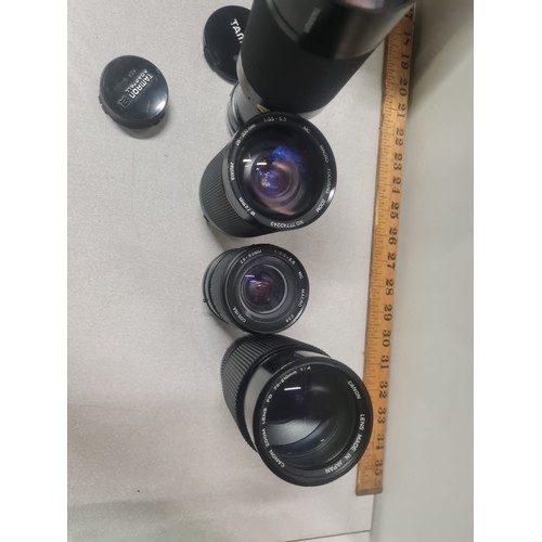 170 - 4 camera lenses to include Canon, Vivatar, Cosina & Tamron