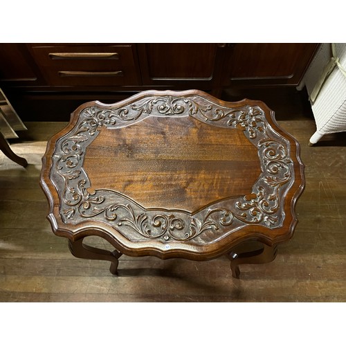 212 - Carved mahogany occasional table.