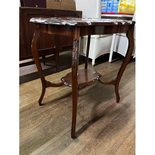 212 - Carved mahogany occasional table.