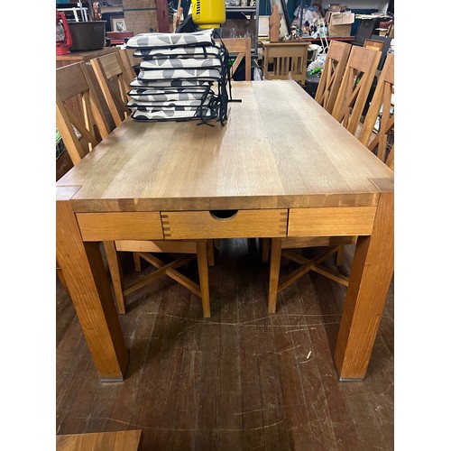 232 - large solid oak table with 8 chairs , top shows signs of ware 200x101x78cm