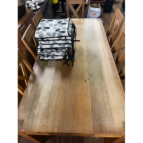 232 - large solid oak table with 8 chairs , top shows signs of ware 200x101x78cm