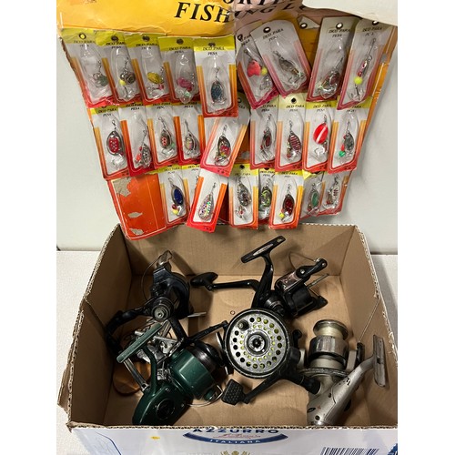 210 - Box of assorted fishing tackle to include trade card lures, reels etc.