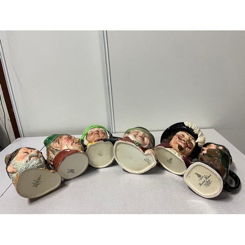 59 - selection of six large Doulton & Beswick toby jugs to include sherlock Holmes etc