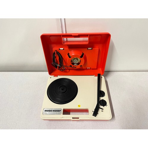 43 - 1970s Solid State Music maker portable record player with built in speaker. working