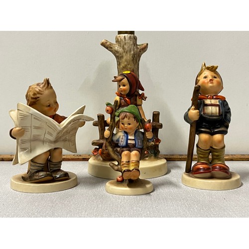138 - Collection of 4 x Goebel Hummels to include 'Just resting' lamp & 'Latest news' etc.