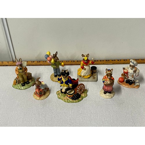 140 - Collection of 7 Royal Doulton Bunnykins figurines to include 'George Washington', & 'Land Girl' etc
