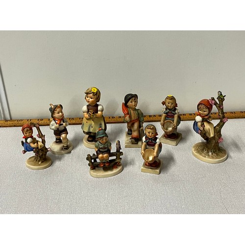 141 - Collection of 8 Goebel Hummel figures to include 'School boy' & 'Merry Wanderer' etc (all as found)
