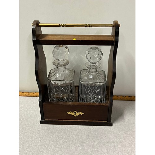 144 - Antique mahogany & brass 2 crystal decanter Tantalus.