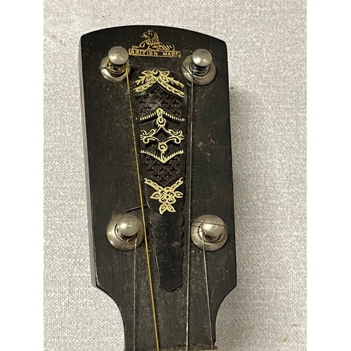 152 - 4 string banjo with decorative white metal back.