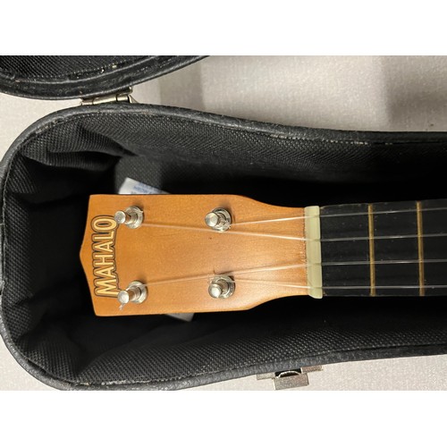 265 - Mahalo ukulele with hard case.