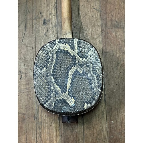 278 - Chinese Sanxian string instrument. Mahogany and snake skin.