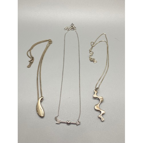 83 - 3 silver chain & pendants