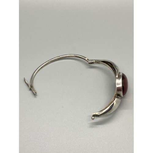14 - silver & amber bangle stamped AMP