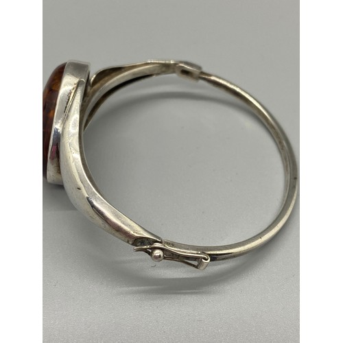 14 - silver & amber bangle stamped AMP