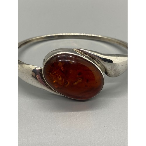 14 - silver & amber bangle stamped AMP