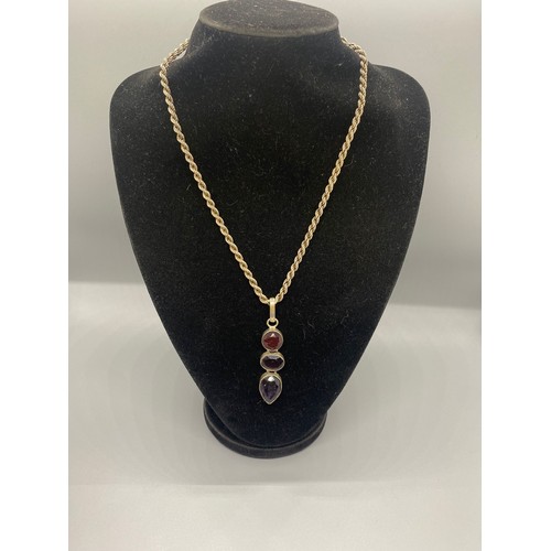 15 - silver rope chain & large gem set pendant