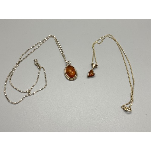 16 - 2 silver & amber chain & pendants