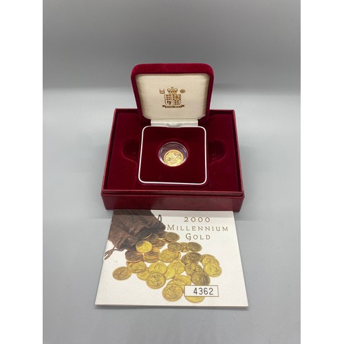 175 - 2000 boxed millennium 22ct gold half sovereign