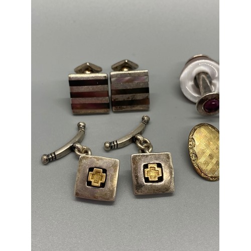 89 - 4 pairs of silver cufflinks