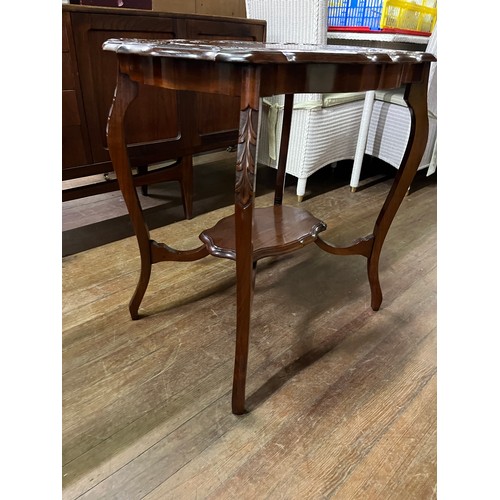 32 - Carved mahogany occasional table.