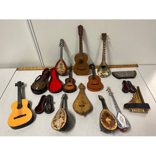 50 - Selection of miniature instruments to include musical etc