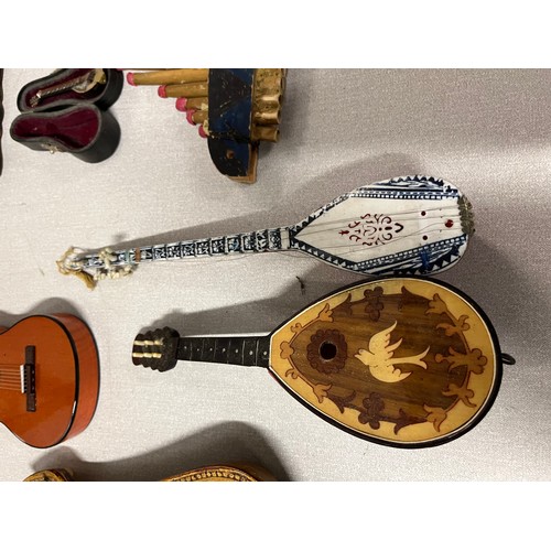 50 - Selection of miniature instruments to include musical etc