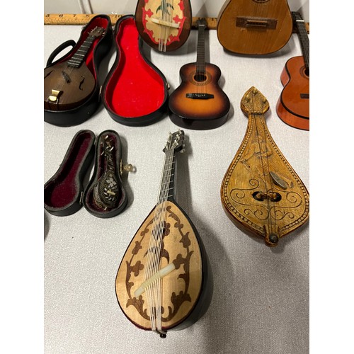 50 - Selection of miniature instruments to include musical etc