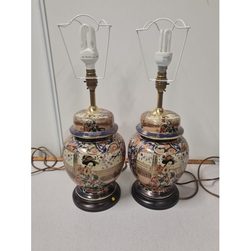 122 - 2 large oriental table lamps with shades.