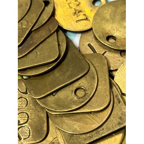 106 - Job lot of brass miners tally tokens