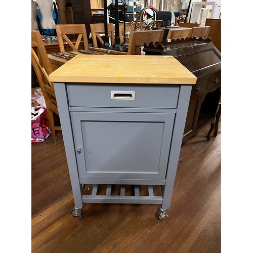 20 - American kitchen island with storage on wheels.