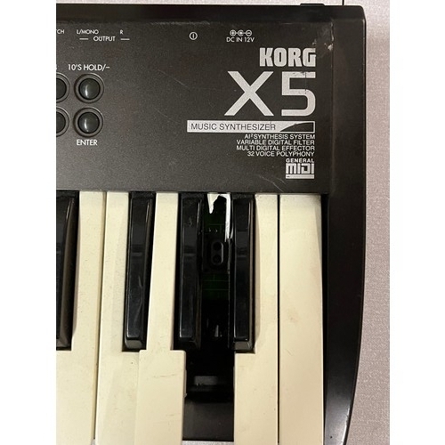 546 - korg x5 midi digital keyboard working but needs new key 
see pics