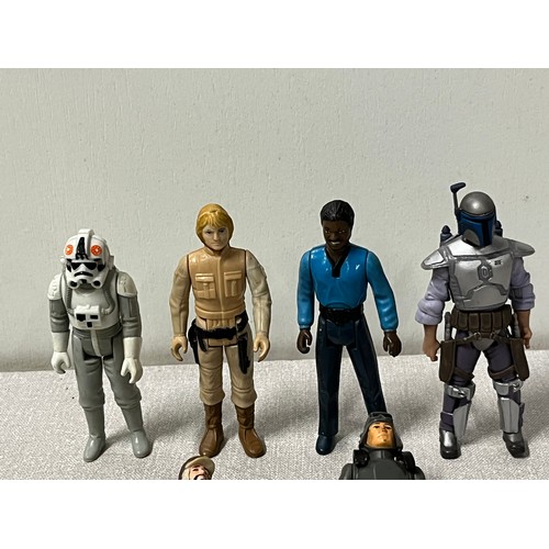 196 - 6 star wars figures to include lando calrissian (1980), at-at commander (1980), jango fett (2007), l... 