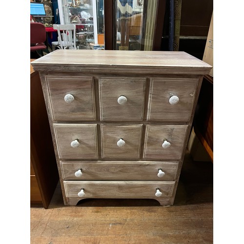 80 - Solid wood multi drawer chest with a white wash finish.