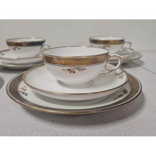 200 - 7 trio tea set 'Brown Rose' by Royal Copenhagen.