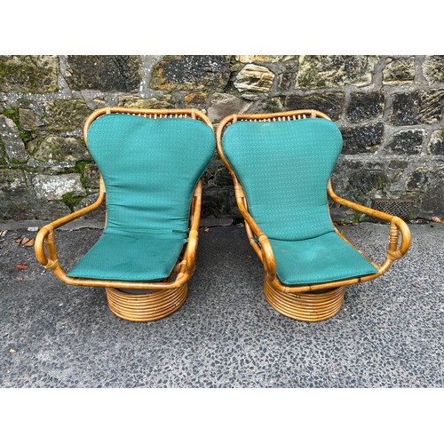 107 - Pair of vintage swivel bamboo armchairs with cushions