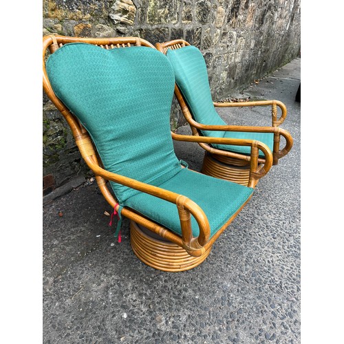 107 - Pair of vintage swivel bamboo armchairs with cushions