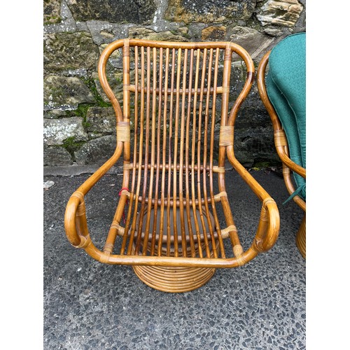 107 - Pair of vintage swivel bamboo armchairs with cushions