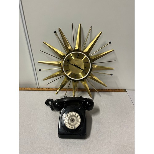 111 - vintage GTO black telephone along with anstey & wilson starburst clock (need attention)