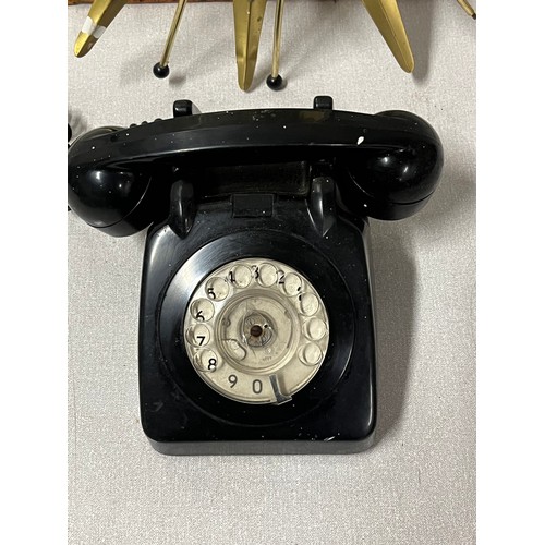 111 - vintage GTO black telephone along with anstey & wilson starburst clock (need attention)