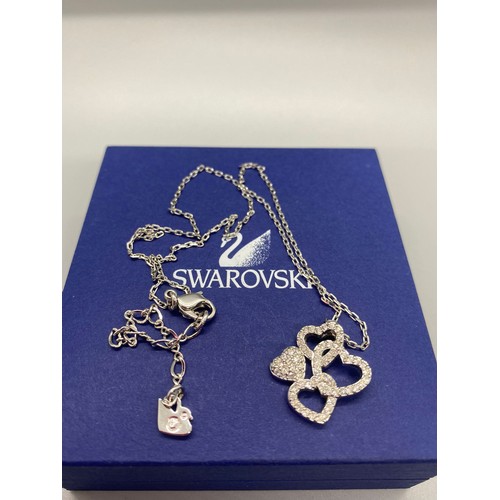 36 - swarovski heart pendent on chain in box along with silver chain