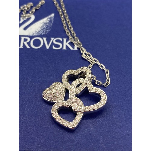 36 - swarovski heart pendent on chain in box along with silver chain