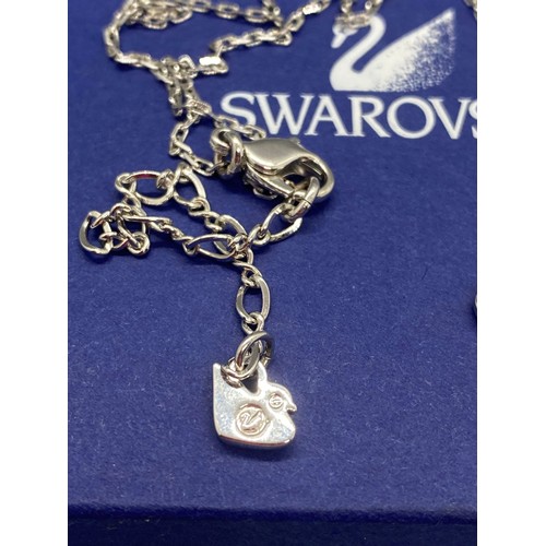 36 - swarovski heart pendent on chain in box along with silver chain