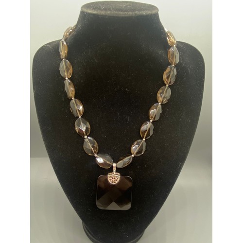 81 - smokey quartz necklace with silver fastenings