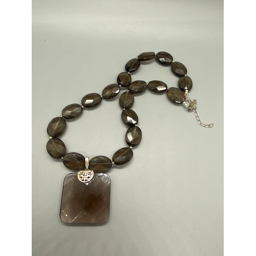 81 - smokey quartz necklace with silver fastenings